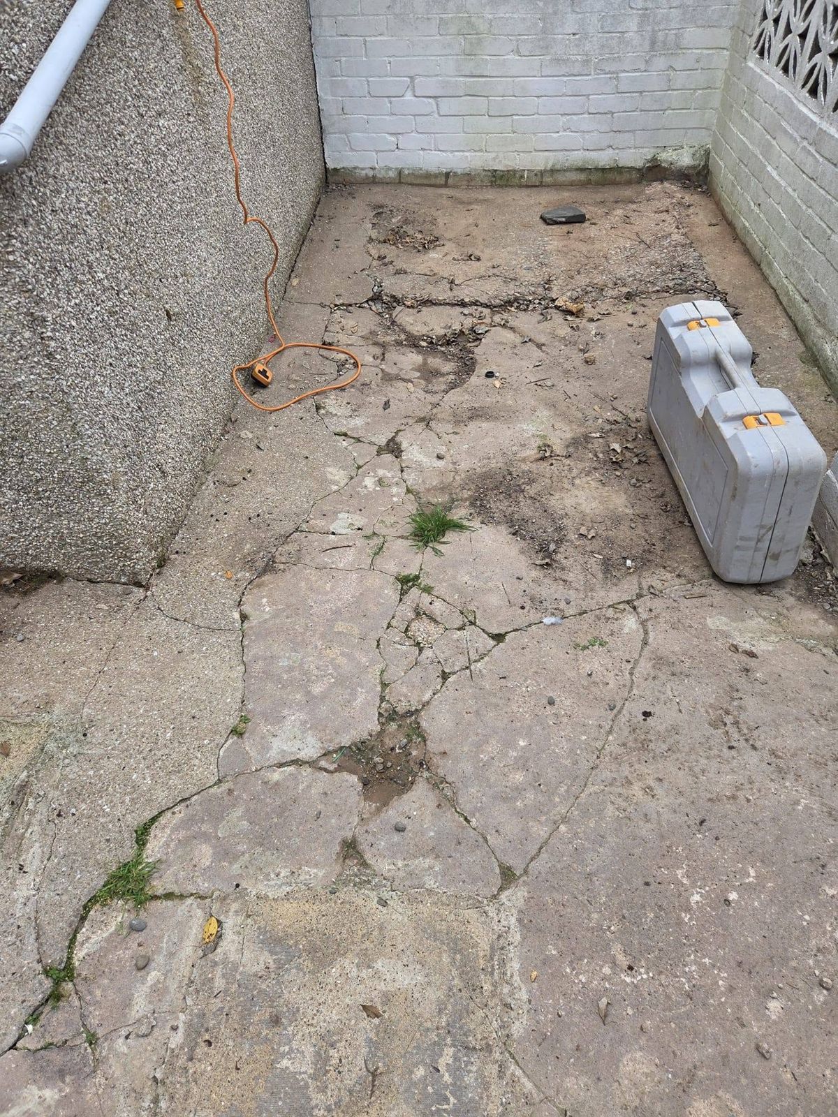 Cracked old concrete in a side passage